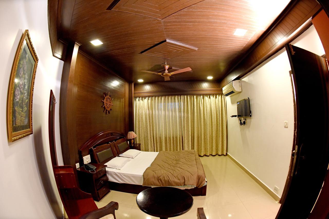 Hotel Sharada International Udupi Bagian luar foto